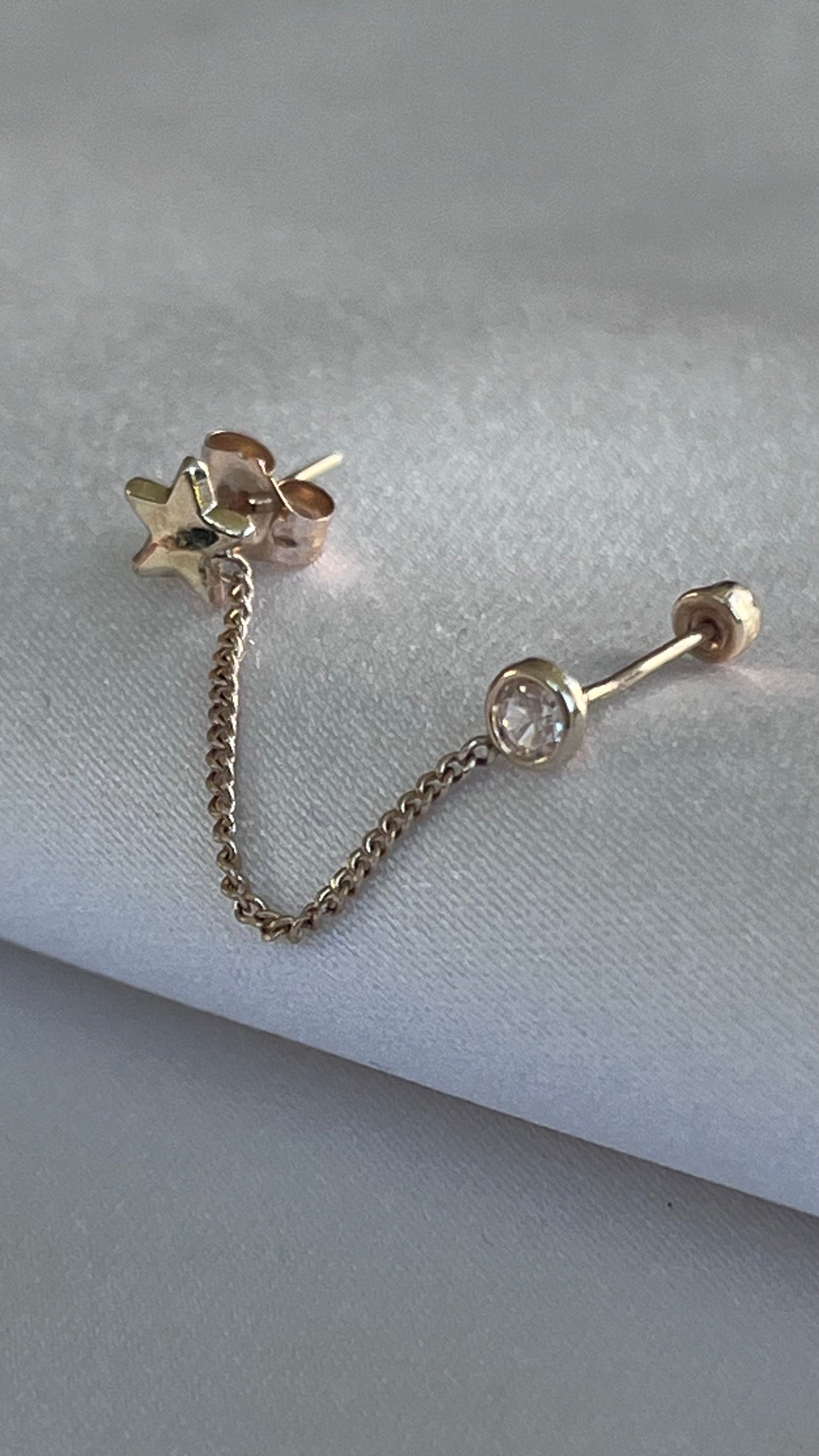 PIERCING ESTRELLA Y CIRCONIA